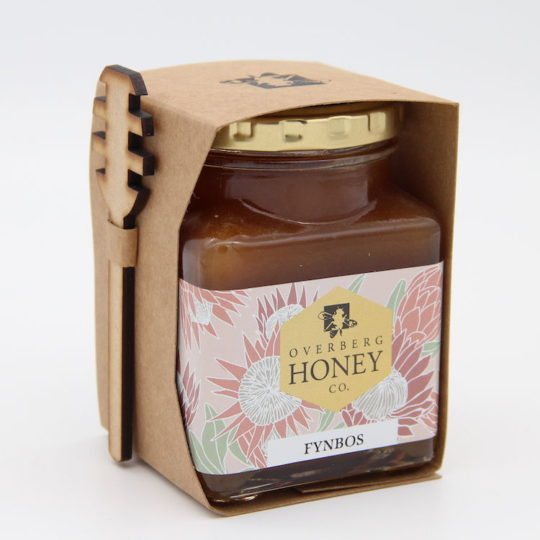 Raw fynbos honey with spoon